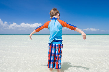 Image showing Little boy in shallow water