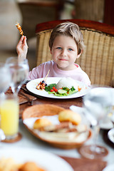 Image showing Boy eating