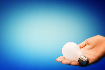 Image showing Background with lit lightbulb