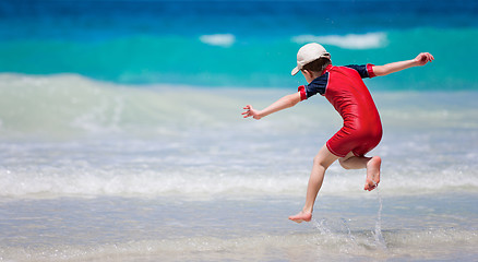 Image showing Little boy having fun at beach