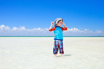 Image showing Little boy in shallow water