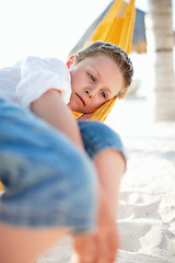 Image showing Cute boy relaxing in hammock