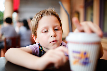 Image showing Boy in cafe