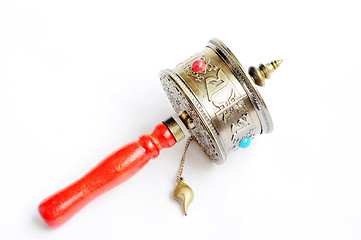 Image showing Tibetan prayer wheel on a white background