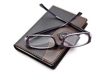 Image showing notebook and glasses 