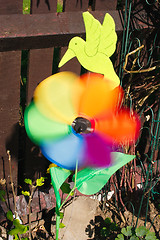 Image showing colorful windmill spinning in the wind