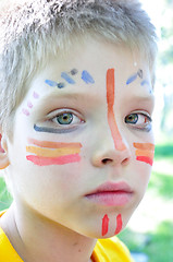 Image showing boy with football paintings on face