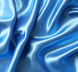 Image showing Smooth elegant dark blue silk as background 