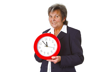 Image showing Senior boss holding a round clock