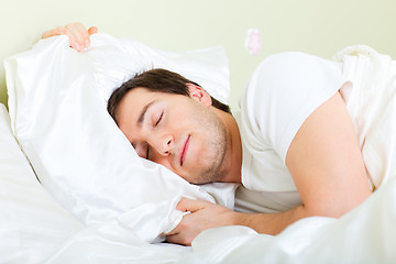 Image showing Man sleeping in bed
