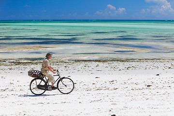 Image showing Cycling along tropical beach