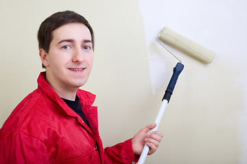 Image showing Man painting a wall