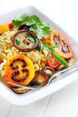 Image showing Pasta with mushrooms and tamarillos