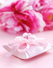 Image showing Pink present box with pacifier