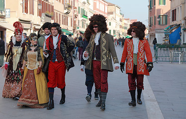 Image showing Group of disguised people