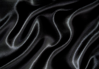 Image showing Smooth elegant black silk as background 