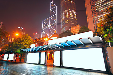 Image showing Blank billboard on bus stop at night 