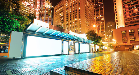 Image showing Blank billboard on bus stop at night 