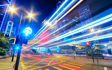 Image showing Modern Urban City at Night with Freeway Traffic