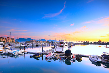 Image showing yachts in the golden coast sunset ,in hongkong 