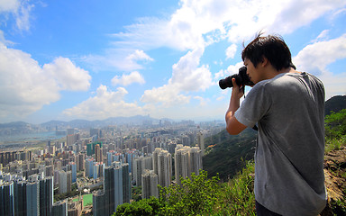 Image showing photographer take photo of city