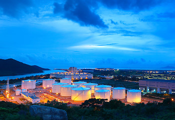 Image showing gas tank at night