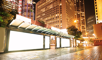 Image showing Blank billboard on bus stop at night 