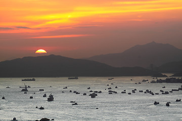 Image showing ships at sunset in the sea 