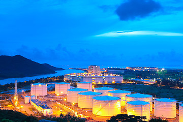 Image showing gas tank at night