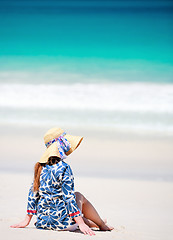 Image showing Young woman relaxing on beach