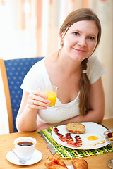 Image showing Woman having breakfast