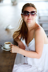 Image showing Woman drinking coffee