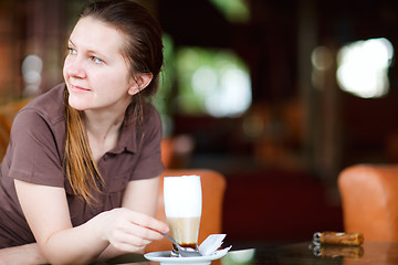 Image showing Woman drinking coffee