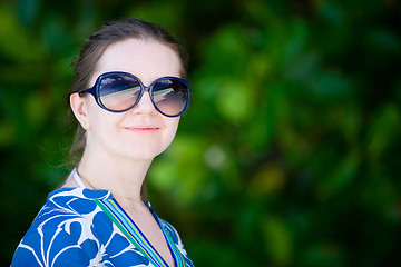 Image showing Portrait of beautiful woman in sun glasses