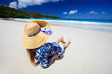 Image showing Young woman relaxing at beach