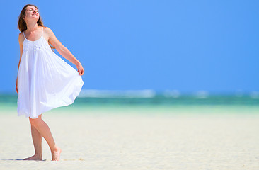 Image showing Woman enjoying beach vacation
