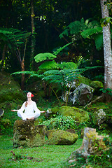 Image showing Woman meditating outdoors