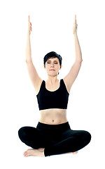 Image showing Portrait of beautiful young woman doing yoga exercise