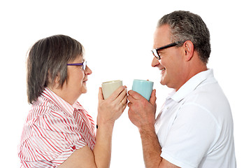 Image showing Romantic senior old couple enjoying coffee