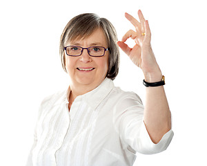 Image showing American lady gesturing excellence sign