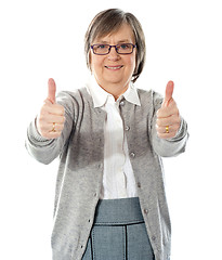 Image showing Woman with double thumbs-up