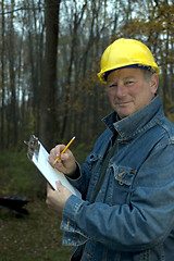 Image showing smiling happy contractor