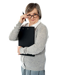 Image showing Corporate woman looking at you