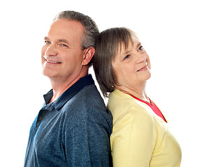 Image showing Closeup shot of aged couple, back to back