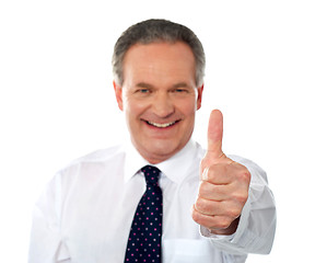 Image showing Matured businessman gesturing thumbs-up