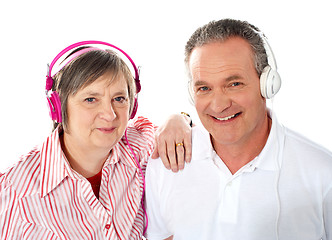 Image showing Cute senior couple listening to music together