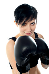Image showing Attractive caucasian girl practicing boxing