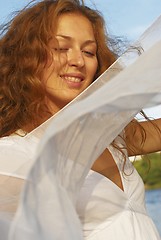 Image showing Young woman with white scarf