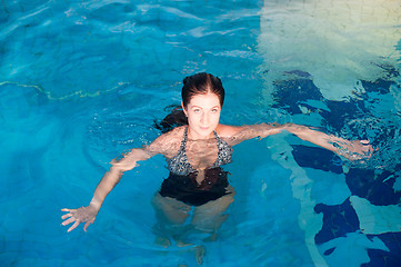 Image showing Attractive girl in swimming pool