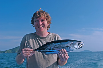 Image showing Man with a fish